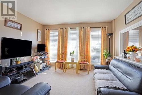 Living Room View 2 - 319 16 Street E, Brooks, AB - Indoor Photo Showing Living Room