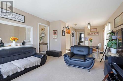 Living Room View 3 - 319 16 Street E, Brooks, AB - Indoor Photo Showing Living Room