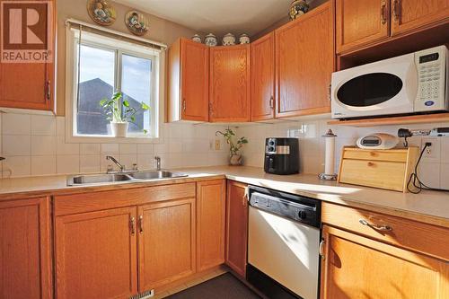 Kitchen View 3 - 319 16 Street E, Brooks, AB - Indoor Photo Showing Kitchen With Double Sink