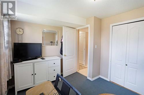 Bedroom or Family Room Basement - 319 16 Street E, Brooks, AB - Indoor