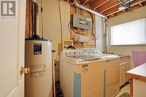 Laundry / Furnace Room View 1 - 319 16 Street E, Brooks, AB - Indoor Photo Showing Laundry Room