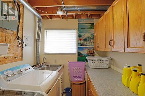 Laundry / Furnace Room View 2 - 319 16 Street E, Brooks, AB - Indoor Photo Showing Laundry Room