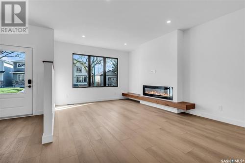 1313 Edward Avenue, Saskatoon, SK - Indoor Photo Showing Living Room With Fireplace