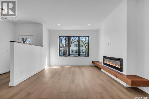 1313 Edward Avenue, Saskatoon, SK - Indoor Photo Showing Living Room With Fireplace