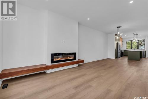 1313 Edward Avenue, Saskatoon, SK - Indoor Photo Showing Living Room With Fireplace