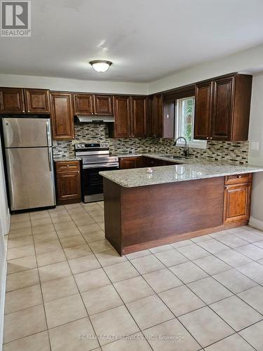 57 Blackmere Circle, Brampton, ON - Indoor Photo Showing Kitchen With Double Sink