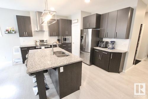 9838 207A St Nw, Edmonton, AB - Indoor Photo Showing Kitchen With Double Sink With Upgraded Kitchen