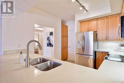 208 - 80 Port Street E, Mississauga, ON - Indoor Photo Showing Kitchen With Double Sink