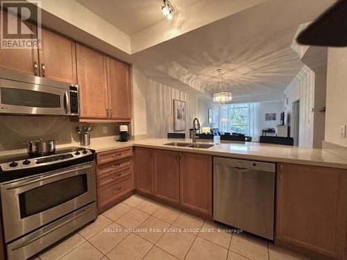 208 - 80 Port Street E, Mississauga, ON - Indoor Photo Showing Kitchen With Double Sink