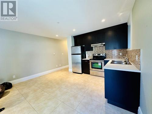 Bsmt 25Xx W 35Th Avenue, Vancouver, BC - Indoor Photo Showing Kitchen With Double Sink