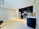 Bsmt 25Xx W 35Th Avenue, Vancouver, BC  - Indoor Photo Showing Kitchen With Double Sink 