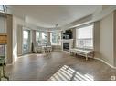 #312 9008 99 Av Nw, Edmonton, AB  - Indoor Photo Showing Living Room With Fireplace 