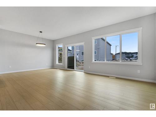 1403 13 Av Nw, Edmonton, AB - Indoor Photo Showing Living Room