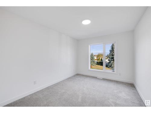 7119 93 Av Nw, Edmonton, AB - Indoor Photo Showing Kitchen With Double Sink