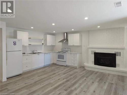 9 Tinatawa Court Unit# Lower, Kitchener, ON - Indoor Photo Showing Kitchen With Fireplace