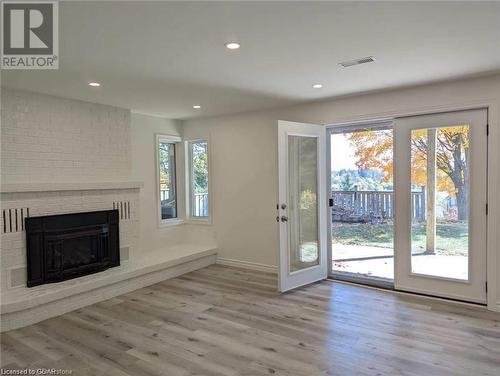 9 Tinatawa Court Unit# Lower, Kitchener, ON - Indoor Photo Showing Living Room With Fireplace