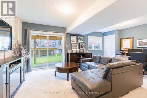 LOWER WALK-OUT: Fam Room, Full Bath, Sep Entrance - 48 - 2235 Blackwater Road, London, ON - Indoor Photo Showing Living Room