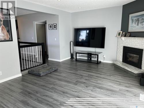 272 Plainsview Drive, Regina, SK - Indoor Photo Showing Living Room With Fireplace