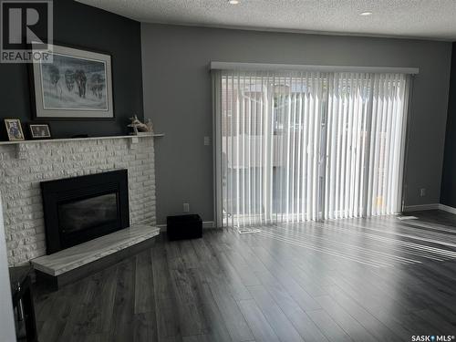 272 Plainsview Drive, Regina, SK - Indoor Photo Showing Living Room With Fireplace