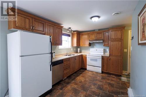 32 Rideout Street, Grand-Sault/Grand Falls, NB - Indoor Photo Showing Kitchen With Double Sink