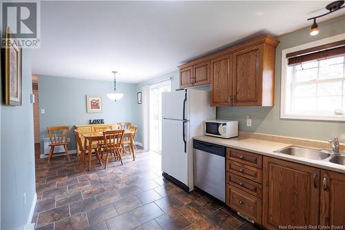 32 Rideout Street, Grand-Sault/Grand Falls, NB - Indoor Photo Showing Kitchen With Double Sink