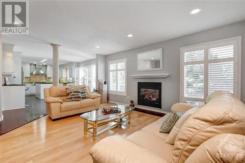 122 Marshfield Street, Ottawa, ON - Indoor Photo Showing Living Room With Fireplace