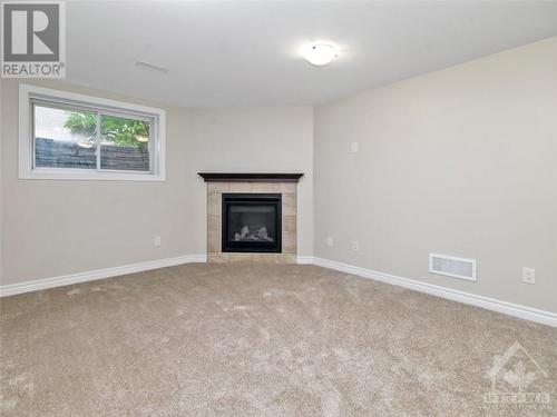 502 Muscari Street, Ottawa, ON - Indoor Photo Showing Living Room With Fireplace