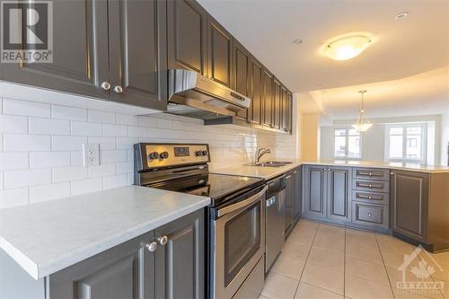 110 Bluestone Private, Ottawa, ON - Indoor Photo Showing Kitchen With Stainless Steel Kitchen With Double Sink With Upgraded Kitchen