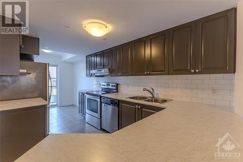 110 Bluestone Private, Ottawa, ON - Indoor Photo Showing Kitchen With Stainless Steel Kitchen With Double Sink