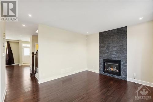 637 Capuchon Way, Ottawa, ON - Indoor Photo Showing Living Room With Fireplace