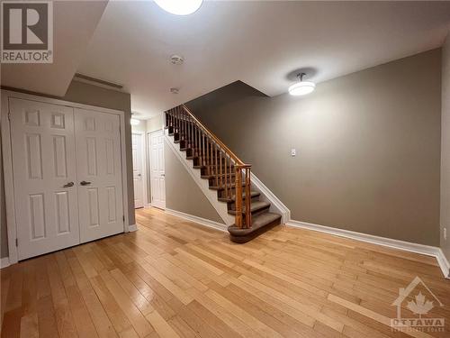 Family room w/ closet space and under stair storage - 407 Mackay Street Unit#B, Ottawa, ON - Indoor Photo Showing Other Room