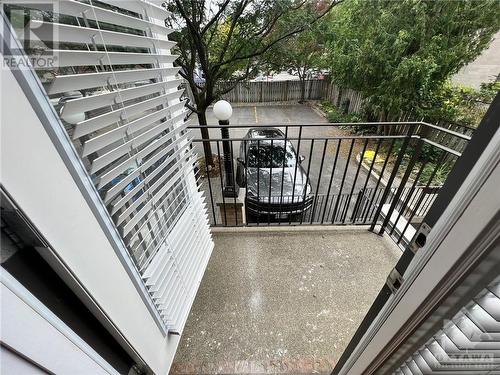 Balcony overlooking patio and fully fenced and tree-lined property - 407 Mackay Street Unit#B, Ottawa, ON - 