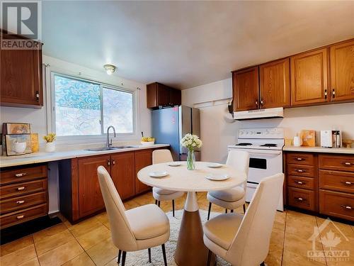 1468 Heatherington Road Unit#D, Ottawa, ON - Indoor Photo Showing Kitchen With Double Sink