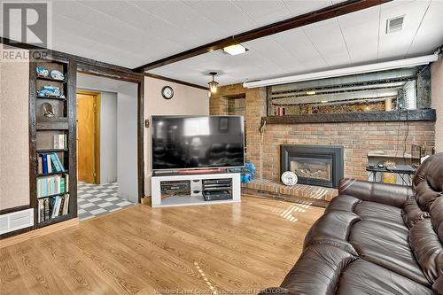 2664 Rivard Avenue, Windsor, ON - Indoor Photo Showing Living Room With Fireplace