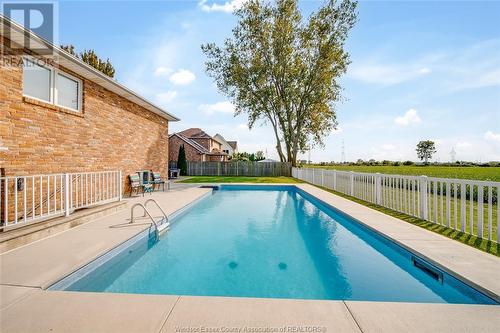 2083 Shawnee Road, Tecumseh, ON - Outdoor With In Ground Pool