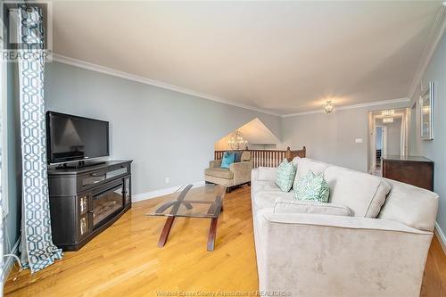 2083 Shawnee Road, Tecumseh, ON - Indoor Photo Showing Living Room With Fireplace