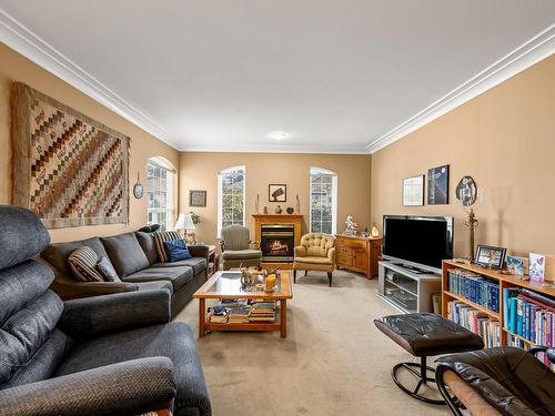 B-4615 Muir Rd, Courtenay, BC - Indoor Photo Showing Living Room With Fireplace