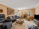 B-4615 Muir Rd, Courtenay, BC  - Indoor Photo Showing Living Room With Fireplace 