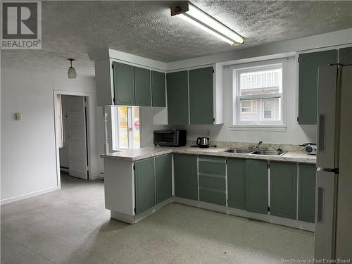 255 St-Francois Street, Edmundston, NB - Indoor Photo Showing Kitchen With Double Sink