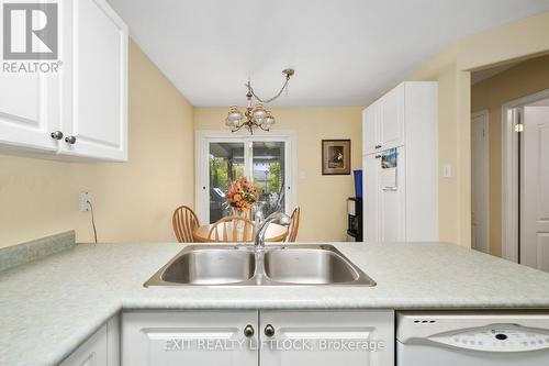 819 Wentworth Street, Peterborough (Monaghan), ON - Indoor Photo Showing Kitchen With Double Sink