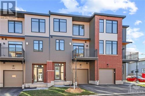 FOR RENT – Enjoy this 1 year old “Holden” model townhouse nestled in the family-friendly community of “Pathways” by eQHomes - 402 Jewelwing Private, Ottawa, ON - Outdoor With Balcony With Facade