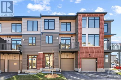 Tailored for young professionals, a small family, or those seeking a hassle free lifestyle with all the desirable conveniences nearby.  Ready for NOVEMBER 1 OCCUPANCY, this 2 bed 2 bath home won’t - 402 Jewelwing Private, Ottawa, ON - Outdoor With Balcony With Facade