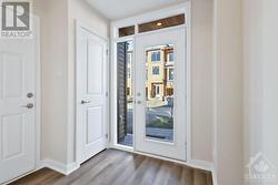 Foyer with closet & indoor access from garage - 