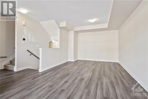 Hardwood floors on main - 402 Jewelwing Private, Ottawa, ON - Indoor Photo Showing Other Room