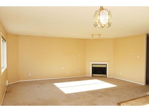 315/319 Green Street, Kimberley, BC - Indoor Photo Showing Other Room With Fireplace