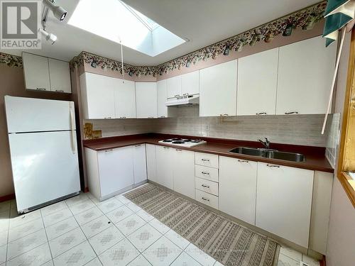 264 Robins Point Road, Tay, ON - Indoor Photo Showing Kitchen With Double Sink