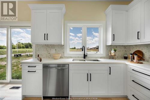 25 Hawthorne Crescent, Tilbury, ON - Indoor Photo Showing Kitchen With Double Sink