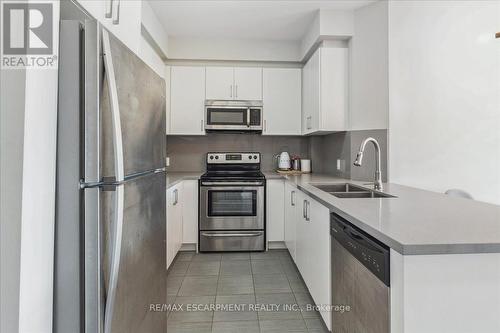 302 - 216 Oak Park Boulevard, Oakville, ON - Indoor Photo Showing Kitchen With Stainless Steel Kitchen With Double Sink