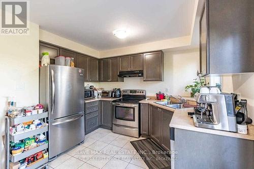 36 - 6020 Derry Road, Milton, ON - Indoor Photo Showing Kitchen With Stainless Steel Kitchen With Double Sink