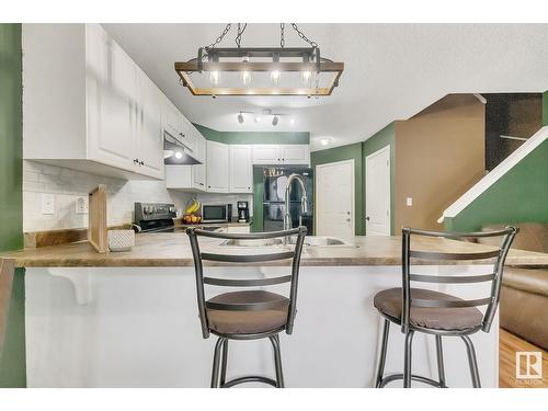 #120 5001 62 Street Nw, Beaumont, AB - Indoor Photo Showing Kitchen